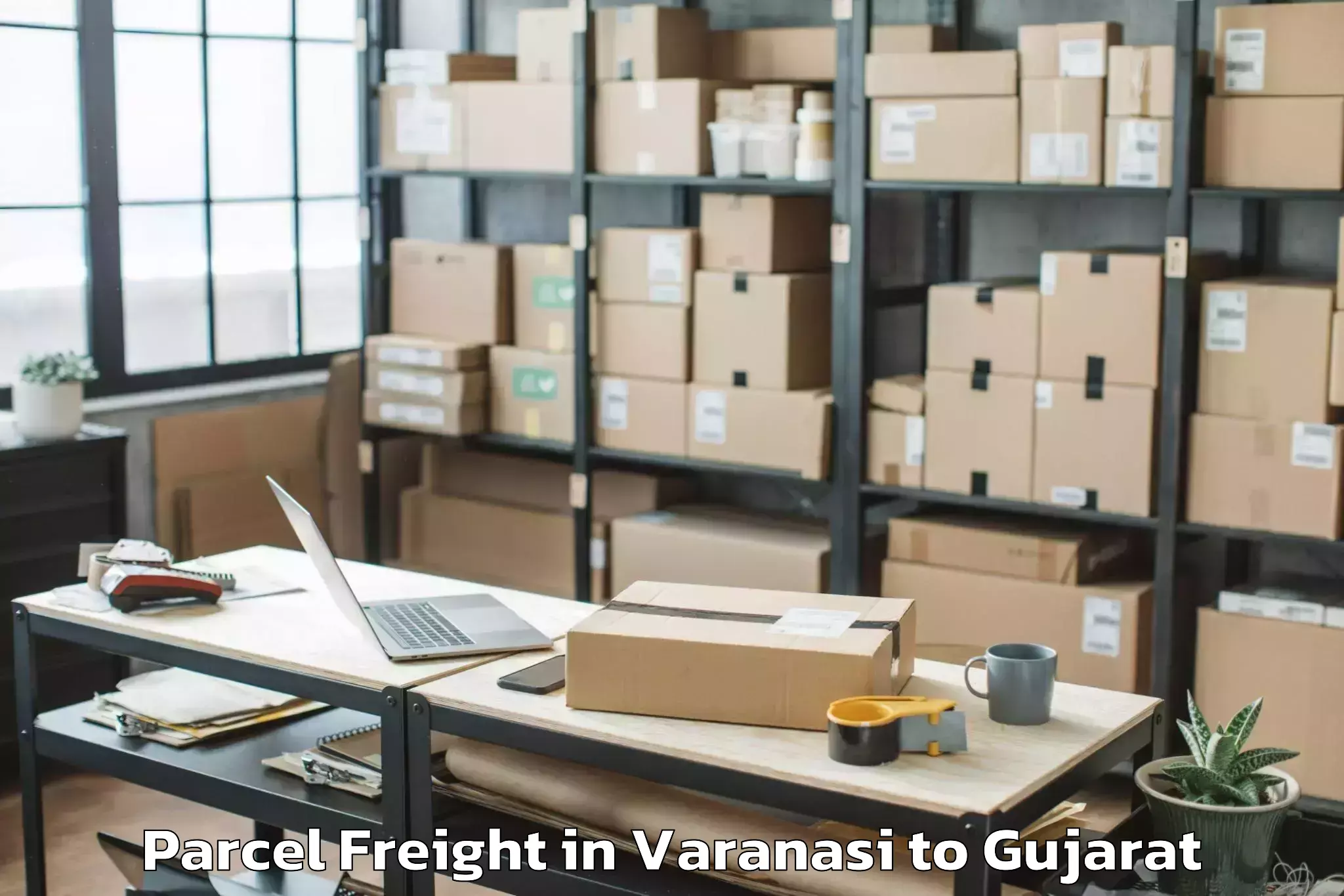 Varanasi to Hazira Parcel Freight Booking